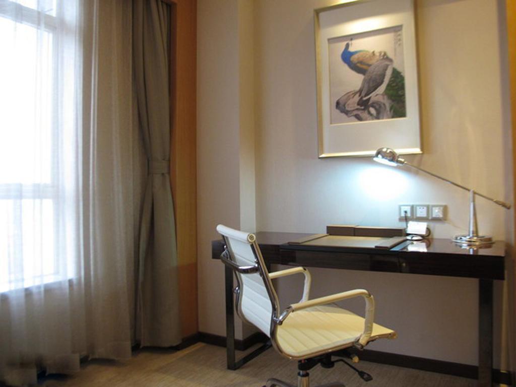 Guangzhou Manguo Internation Hotel Oda fotoğraf